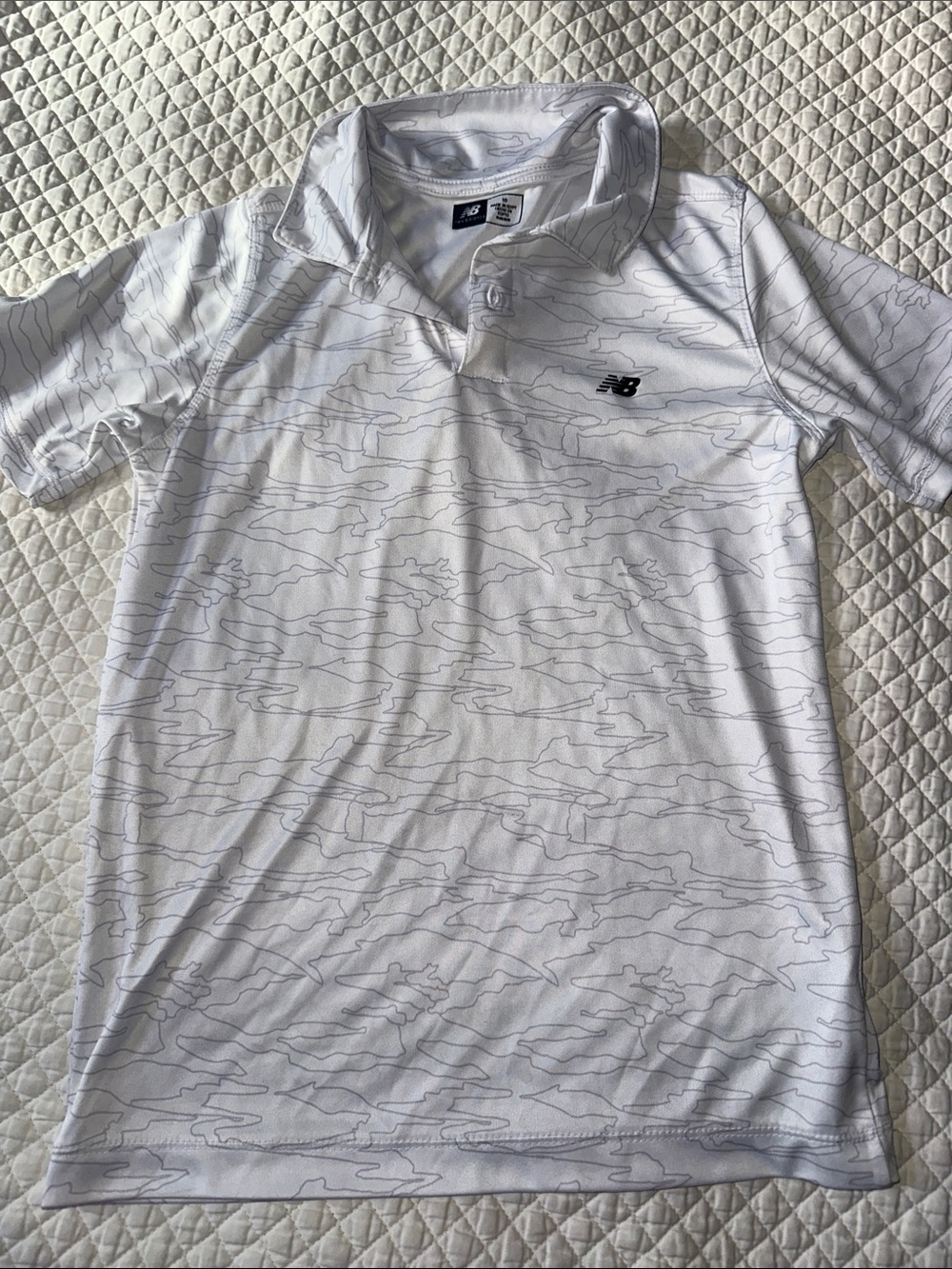 New Balance White Polo with Subtle Gray Pattern